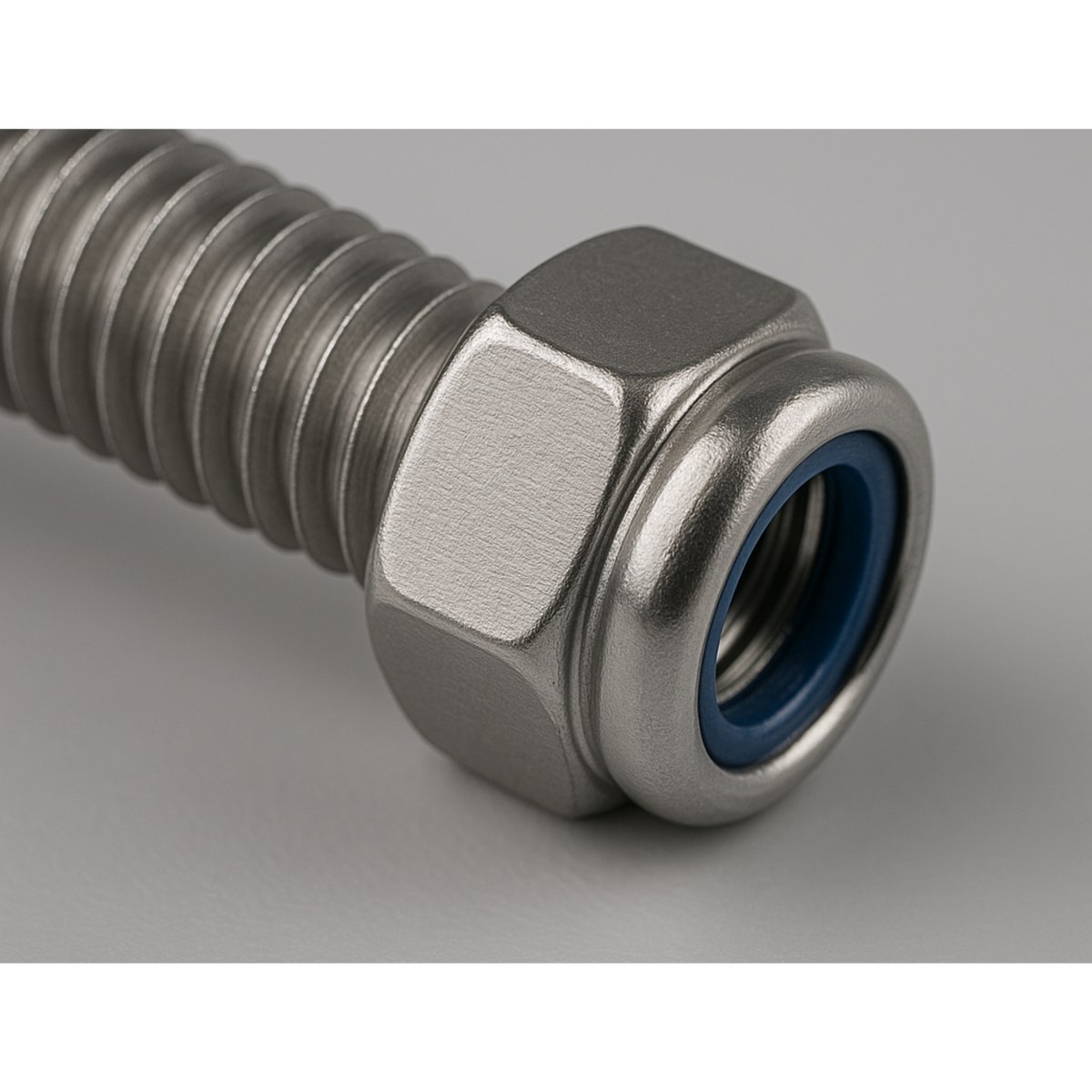 Stainless steel nyloc nut fitted on a threaded bolt