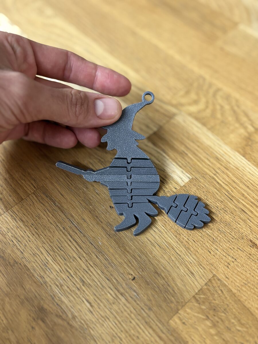 Booflex Iv – Flexi Witch On A Broom Keychain