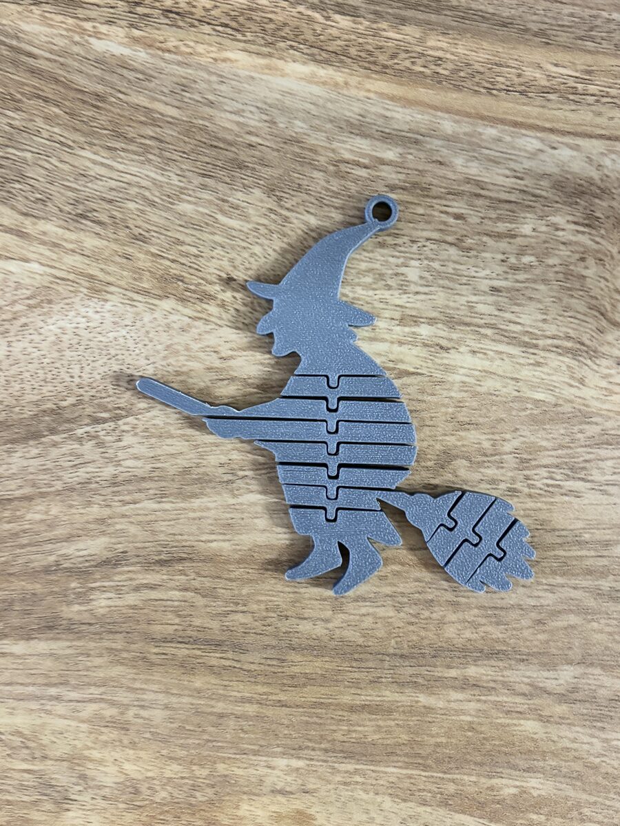 Booflex Iv – Flexi Witch On A Broom Keychain
