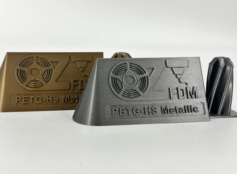 OzFDM logo plaques printed in PETG-HS Metallic gold and grey