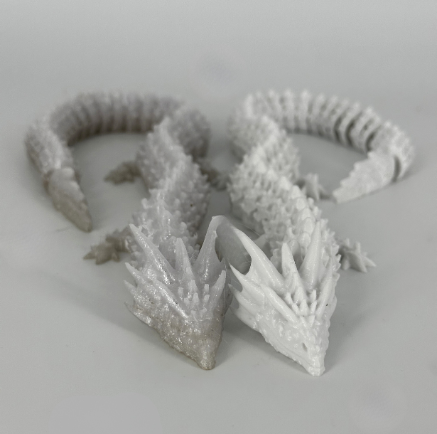 Articulated dragon printed in white OzFDM PolyCarbonate