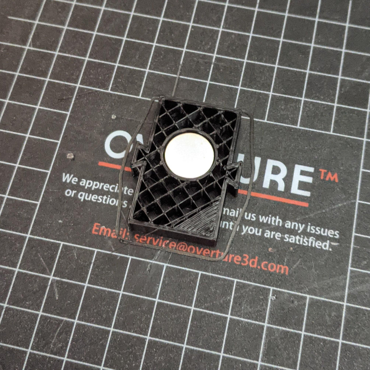 Neodymium magnet embedded in a black 3D printed part