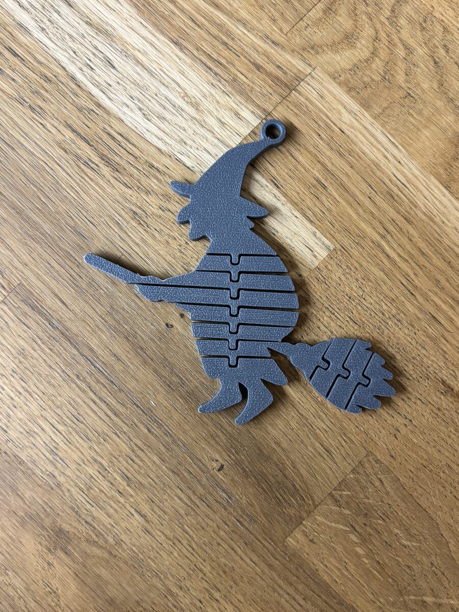 Booflex Iv – Flexi Witch On A Broom Keychain