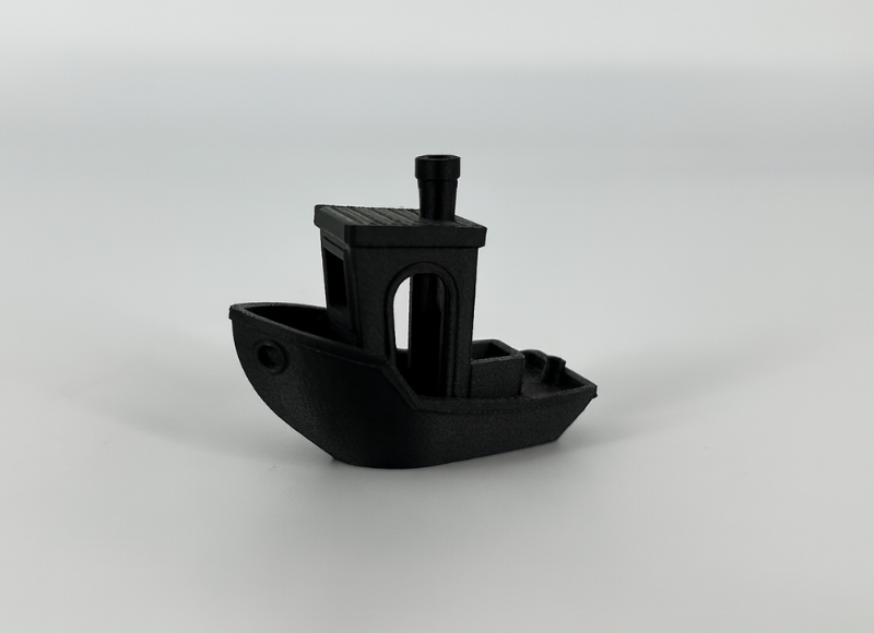 Benchy boat, OzFDM ASA-CF Black. 3D printed by Global3D
